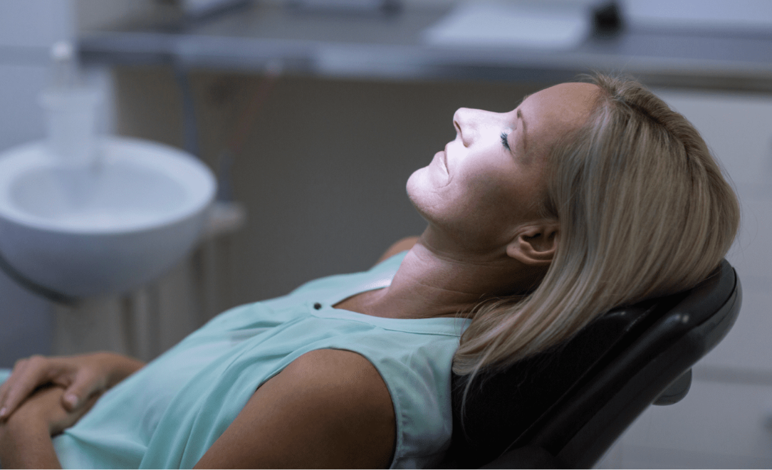Woman under dental sedation