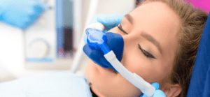 Woman under dental sedation